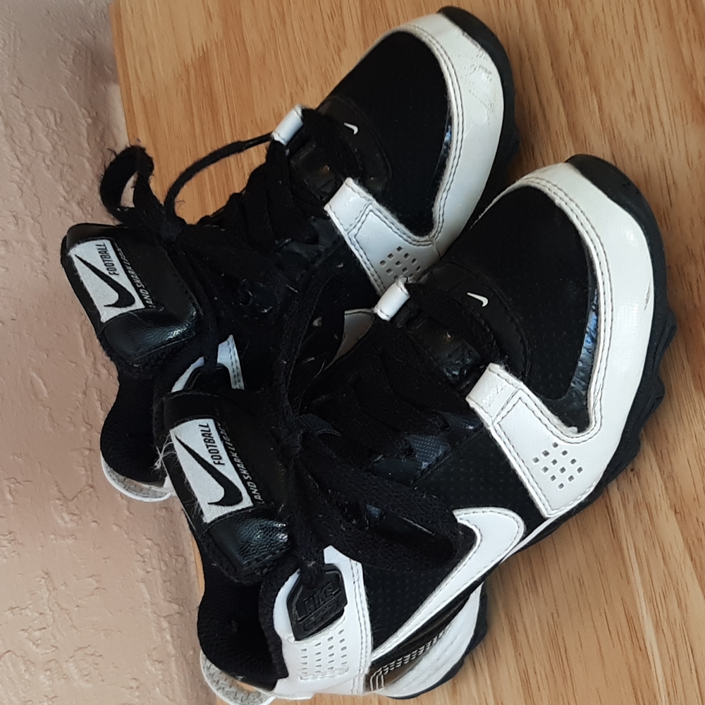 Nike black and white hi-top cleats Size 12 kids
